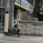 Swinging child on electric wire
