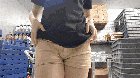 Pizza delivery girl showing off the goods