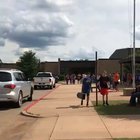 Dad embarrasses son by picking him up from school in a speedo